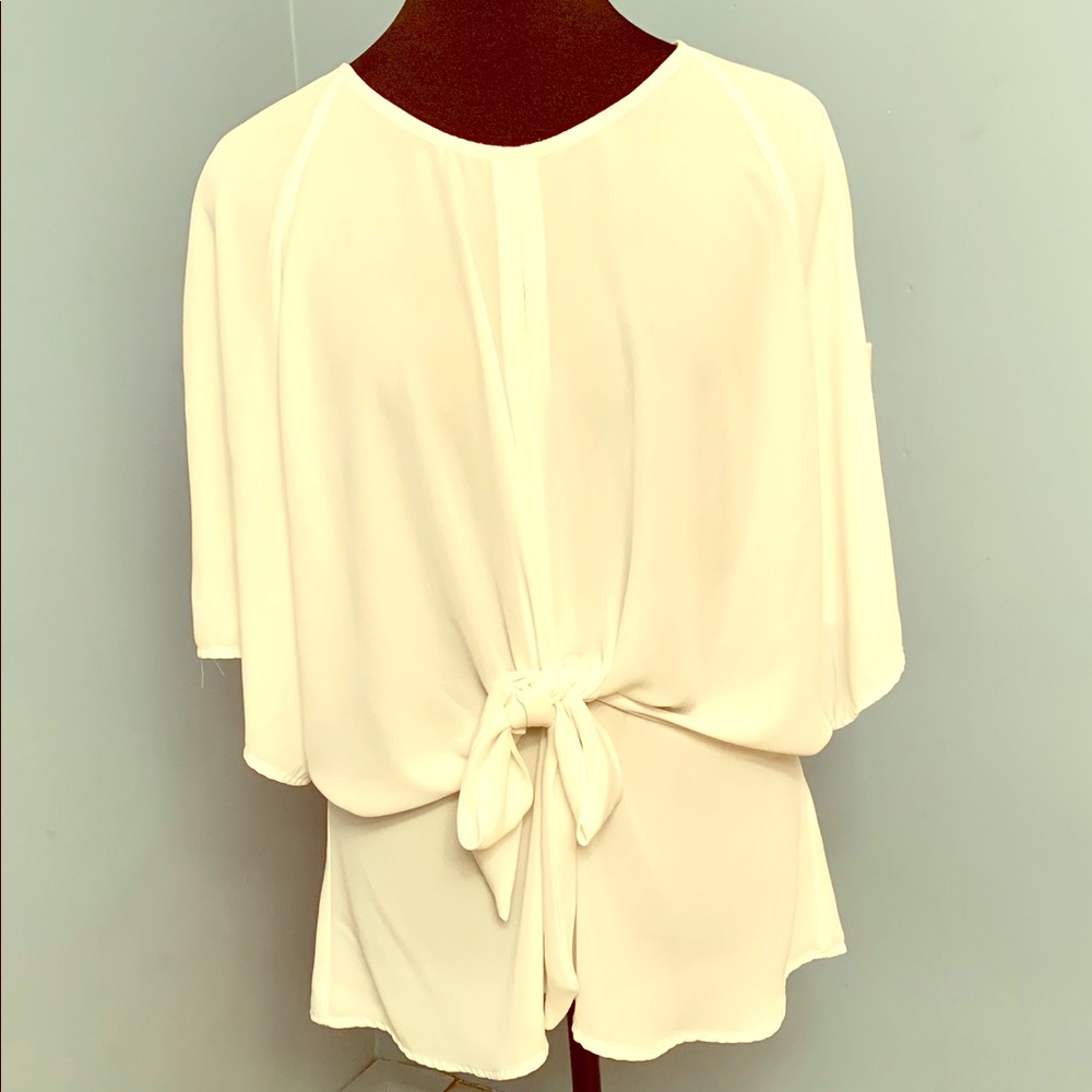 Pretty and flowy off white blouse